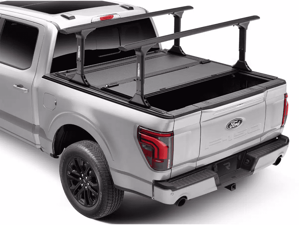 Ford pickup truck with bed racks and bumper guard for enhanced cargo and safety.